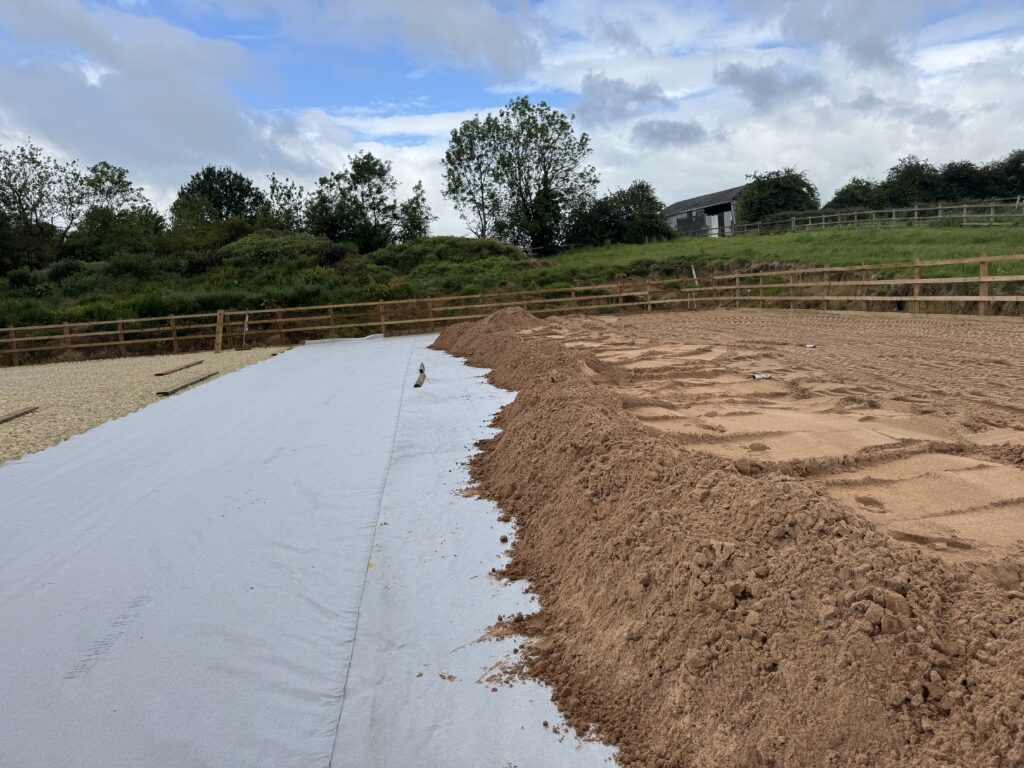 equine menege construction with Intershape's non-woven geotextile arena membrane